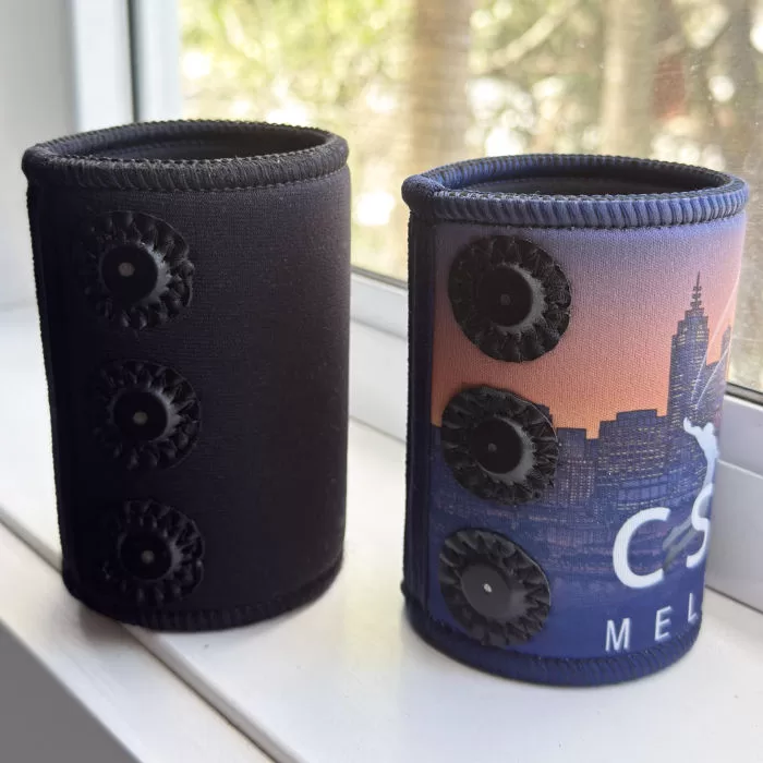 Magnetic stubby holders in Australia next to a window